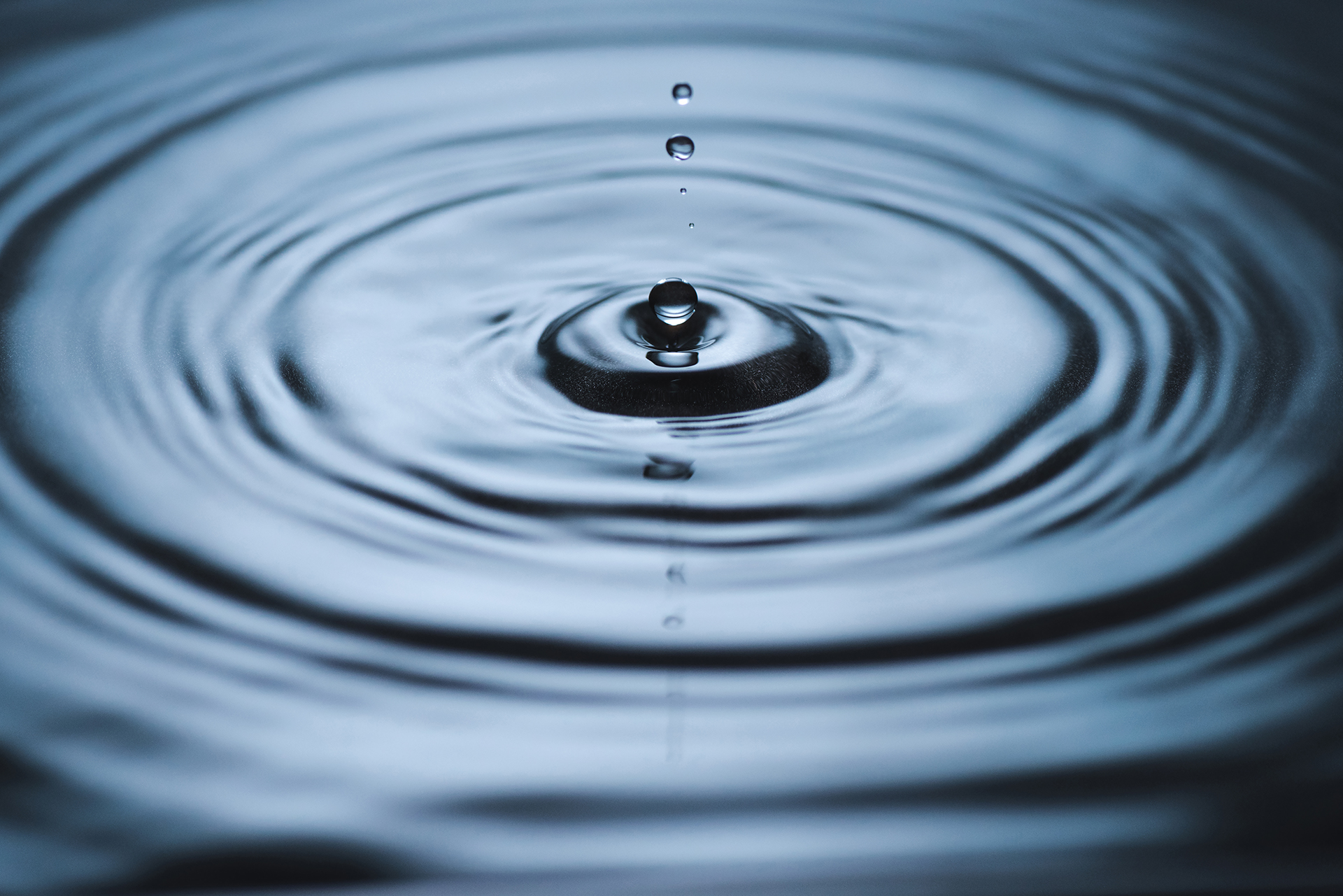 Splash of water drop on water surface